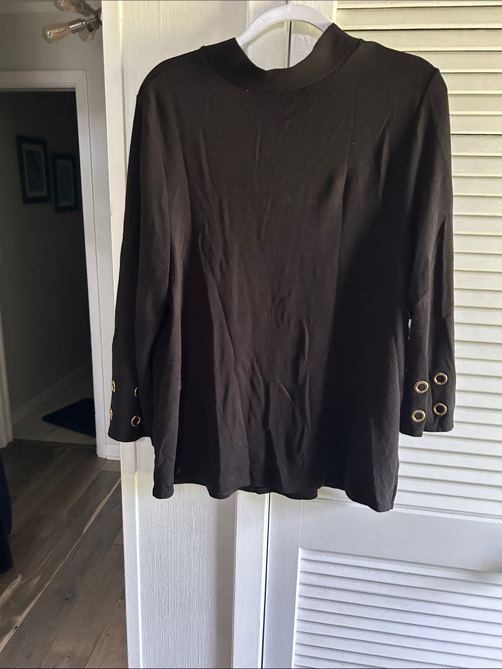 Chico's Black Long-Sleeve Top with Grommet Cuff and Hem Details